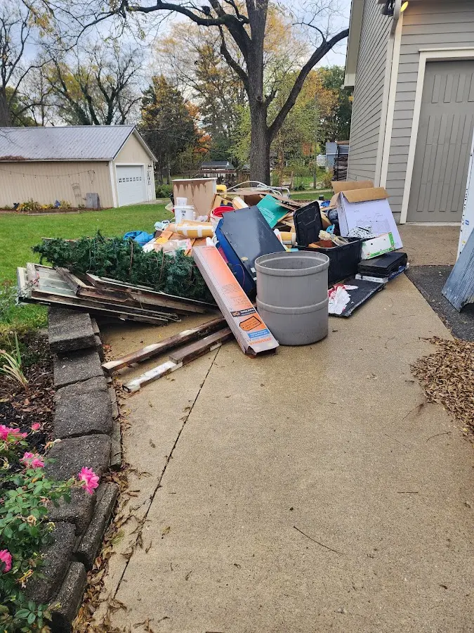Dumpster being loaded with debris for 3 Yard Dumpster Rental in Yorkshire